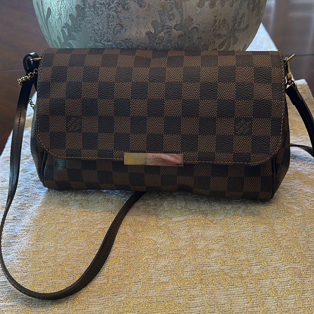 Classic LV can be Hand or Crossbody purse.